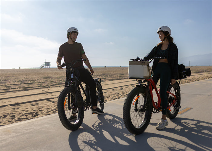 Cycling on TESWAY S7 and starting a beach ride with your partner